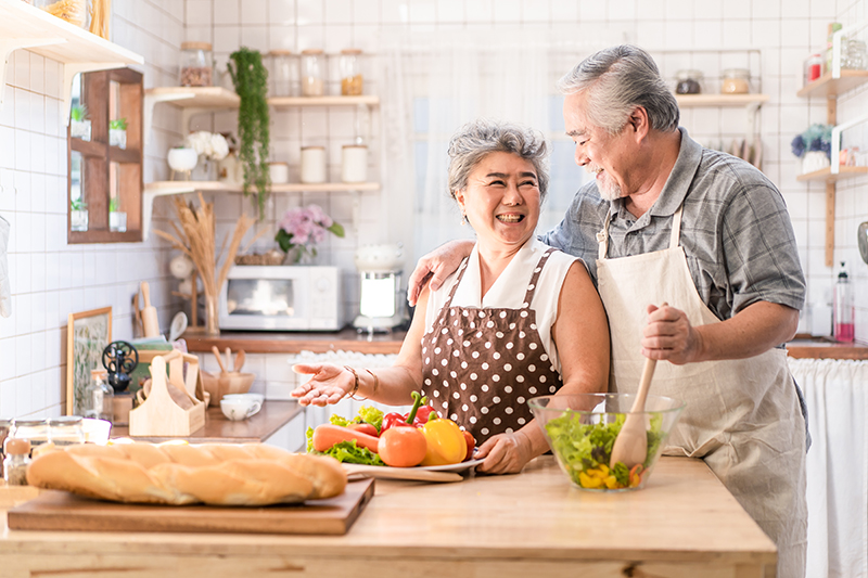 Couple senior couple happy living in home kitchen