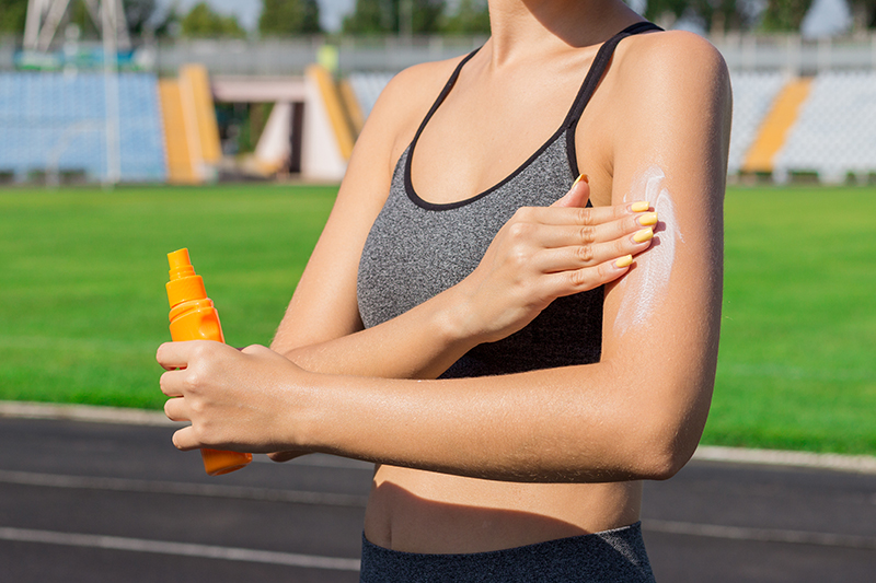 Applying sunscreen